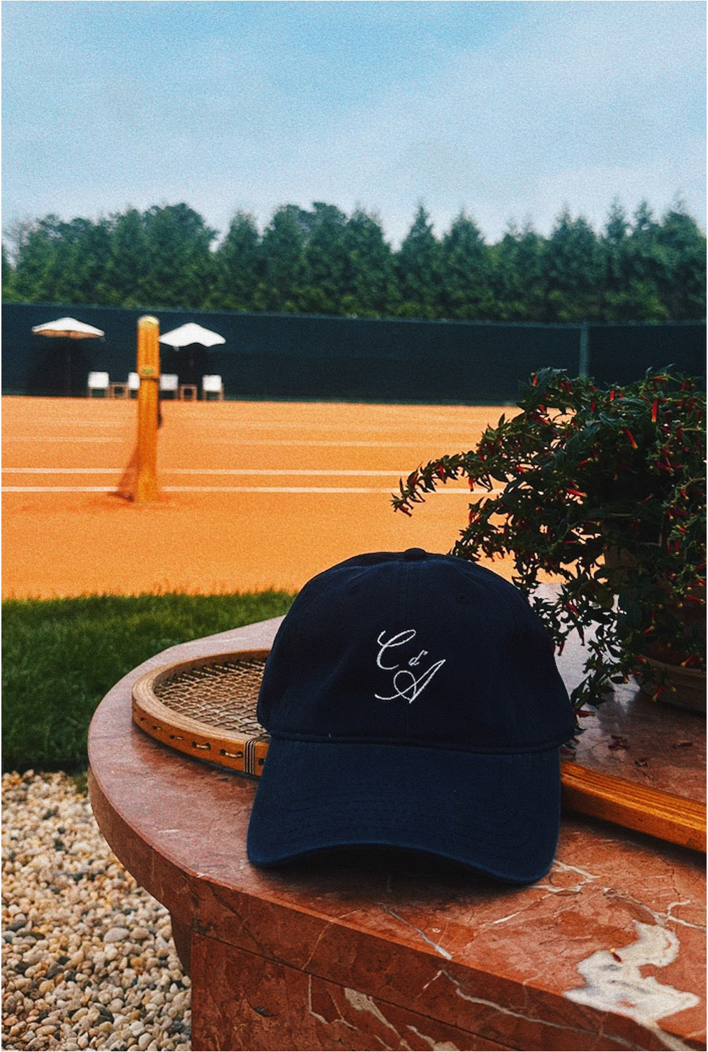Club d'Antibes cabriolet hat vintage tennis racquet