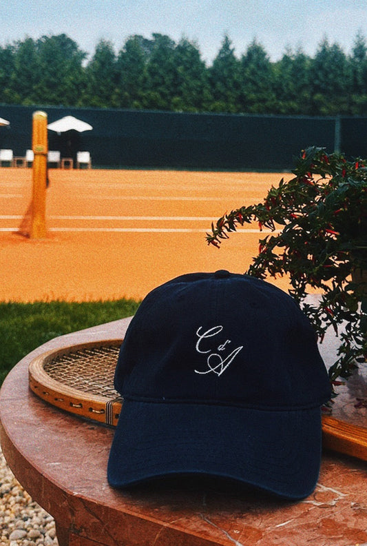 Club d'Antibes cabriolet hat vintage tennis racquet