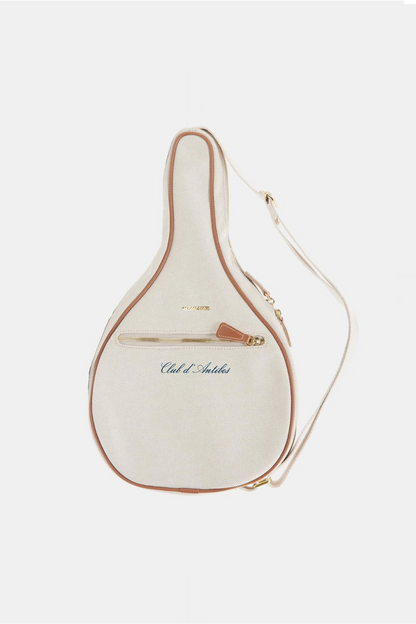 Cream-colored leather bag with gold trim on a white background